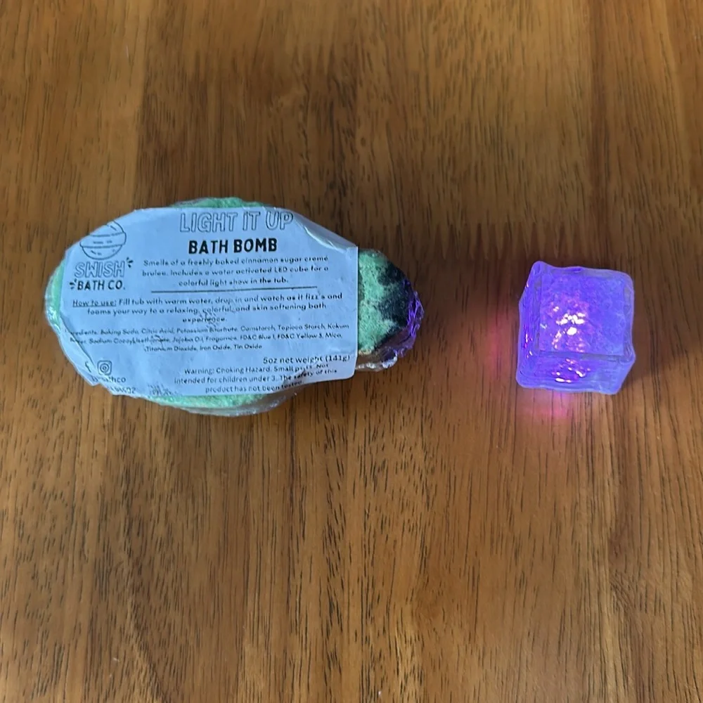 Bath bomb. Christmas bulb design with Christmas cookie smell. Lights up
